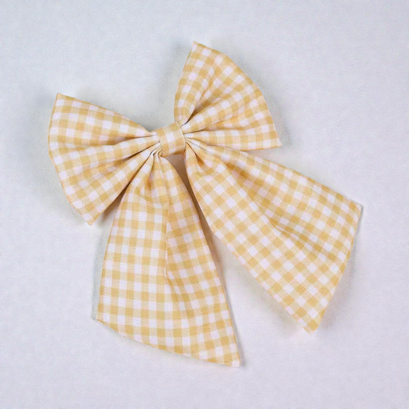 The LRW Hair Accessory Edit (muted yellow gingham bow)