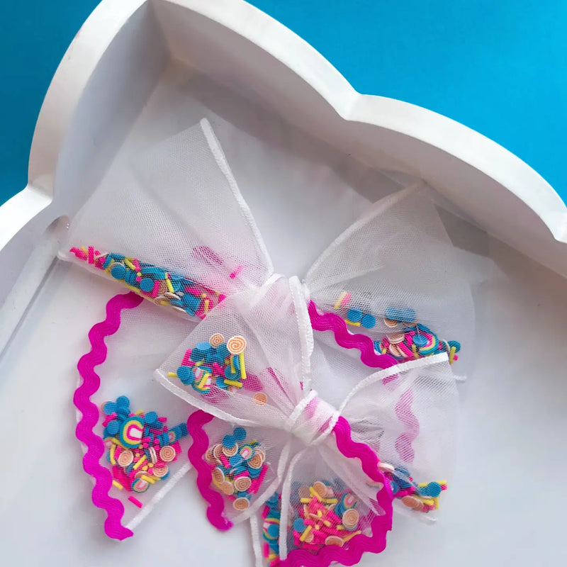 Shimmy Shake Bows (small magenta  pool party clip)