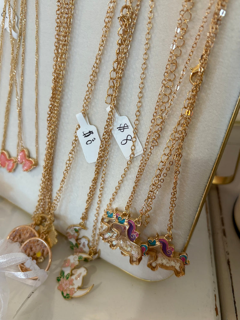 LRW Spring/summer accessory edit (unicorn shaker necklace)