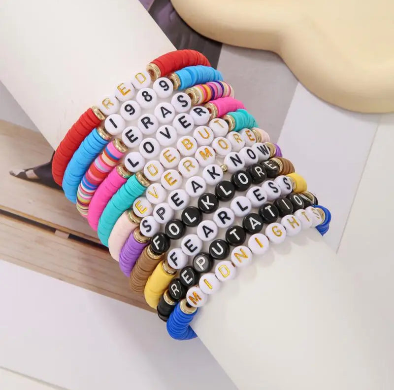 A Stack of Swiftie Bracelets