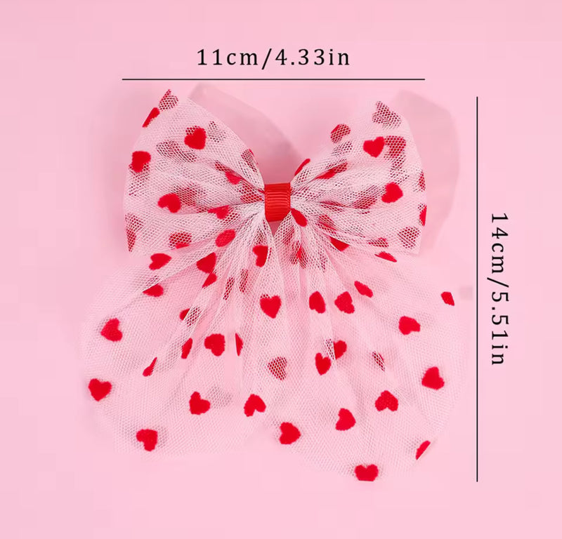 The LRW Hair Accessory Edit (pink tulle heart bow)