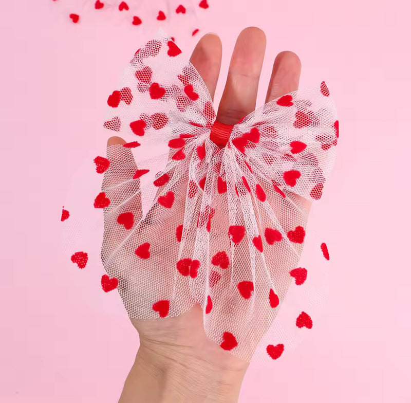The LRW Hair Accessory Edit (pink tulle heart bow)