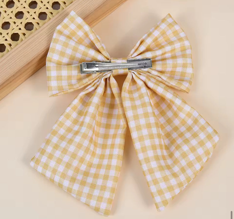 The LRW Hair Accessory Edit (muted yellow gingham bow)