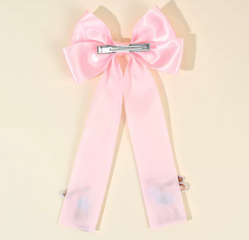 The LRW Hair Accessory Edit (pink satin bunny bow)