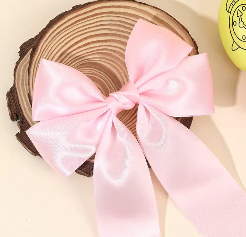 The LRW Hair Accessory Edit (pink satin bunny bow)