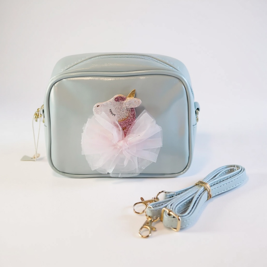 The LRW Accessory Edit (iridescent blue unicorn bag)