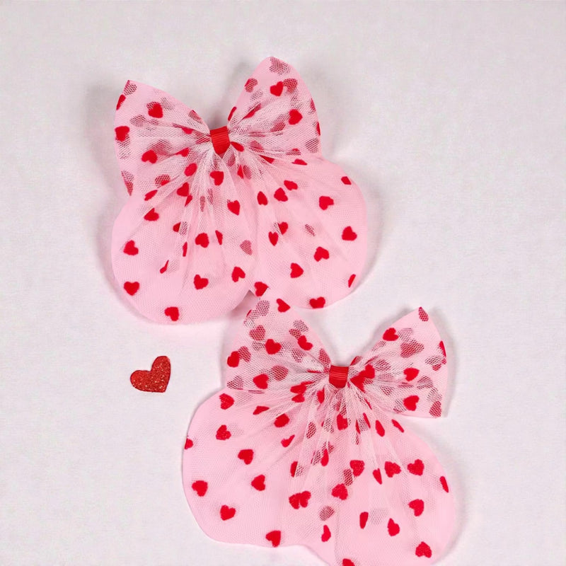 The LRW Hair Accessory Edit (pink tulle heart bow)