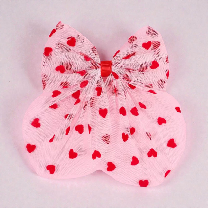 The LRW Hair Accessory Edit (pink tulle heart bow)